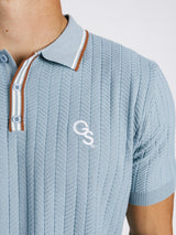 Light blue Georgia Southern men's ribbed polo shirt by Arena Graffiti, featuring the "GS" logo and classic polo design.
