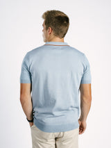 Light blue Georgia Southern men's ribbed polo shirt by Arena Graffiti, featuring the "GS" logo on the chest.