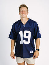 Georgia Southern men's navy jersey by Arena Graffiti with "JD" lettering, displayed on a hanger with a plain background.