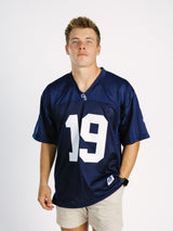 Georgia Southern men's navy jersey by Arena Graffiti, featuring team logo and athletic design on fabric.