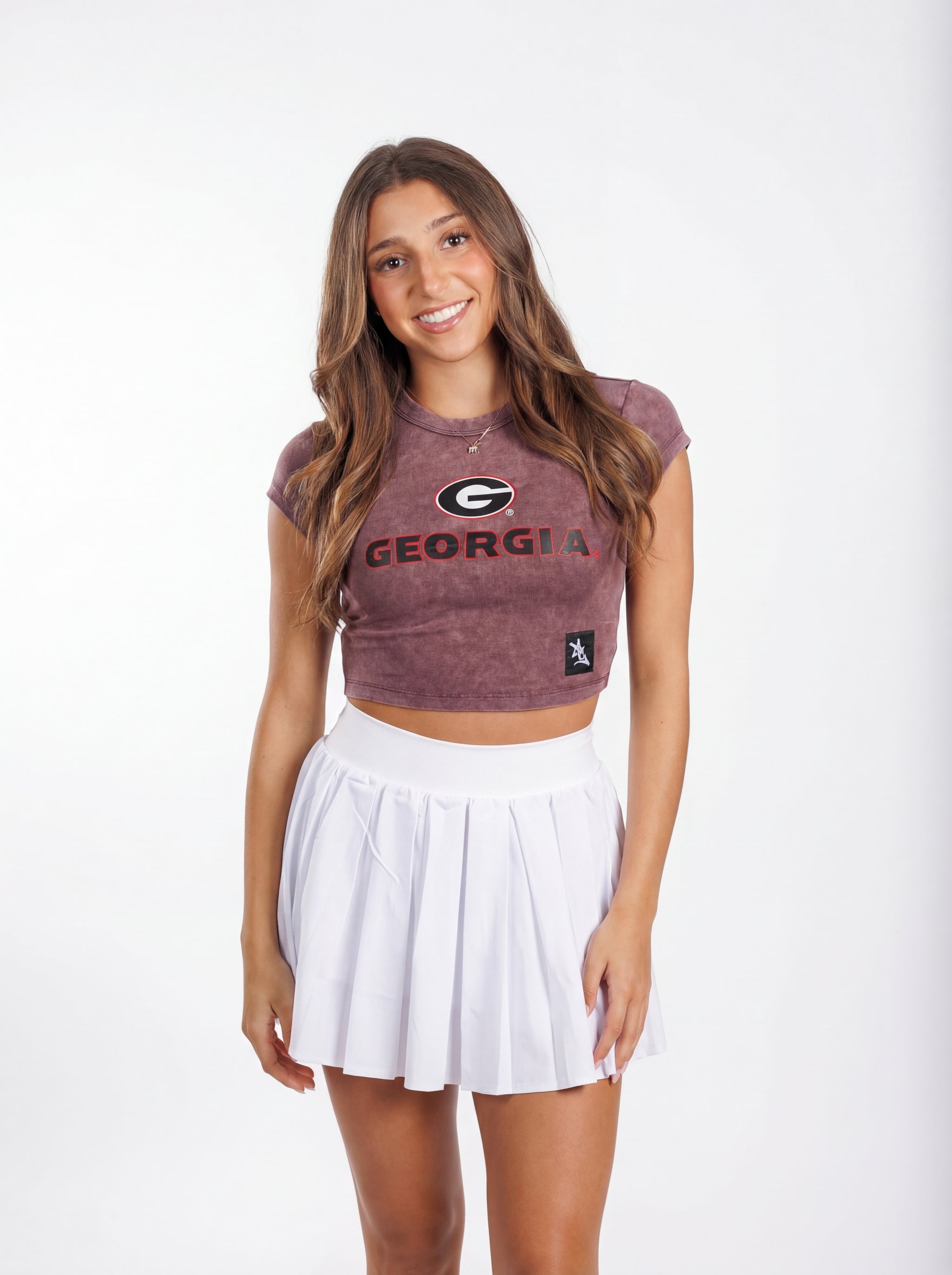 UGA Bulldogs women's vintage "G" crop top by Arena Graffiti, featuring a stylish athletic design and team logo.